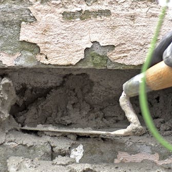 Skifte mursten: Brug rigeligt mørtel Skifte mursten: Brug rigeligt mørtel